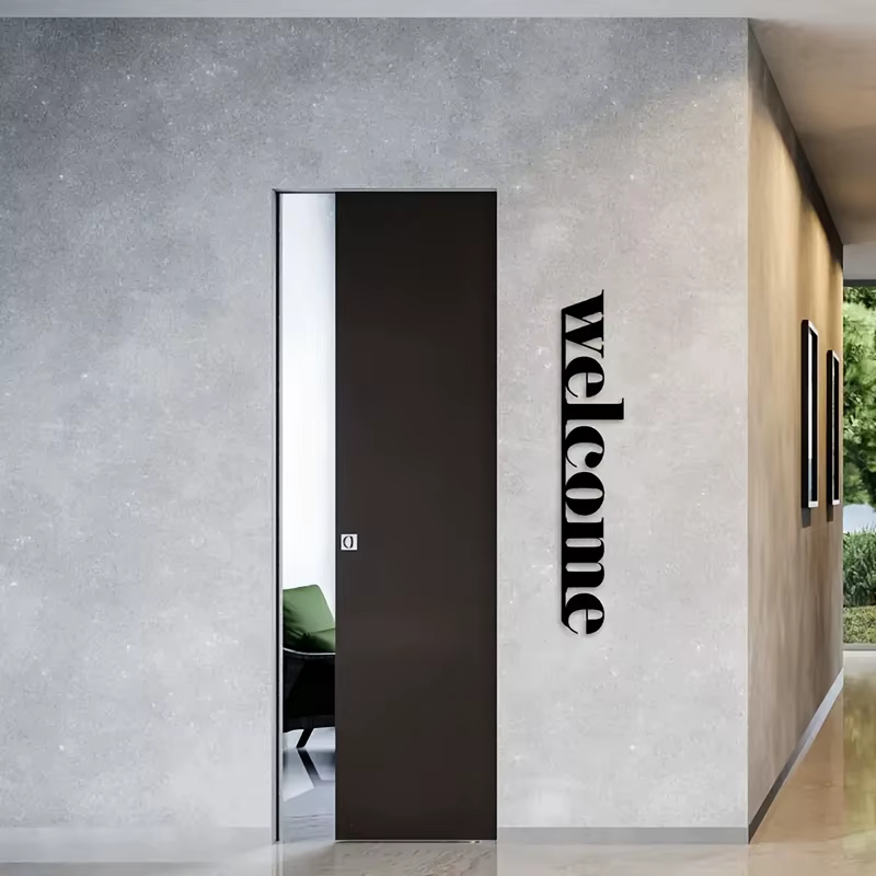 Une élégante décoration de porte d'entrée moderne en métal « Bienvenue », une œuvre d'art murale en fer élégante, idéale pour l'entrée.