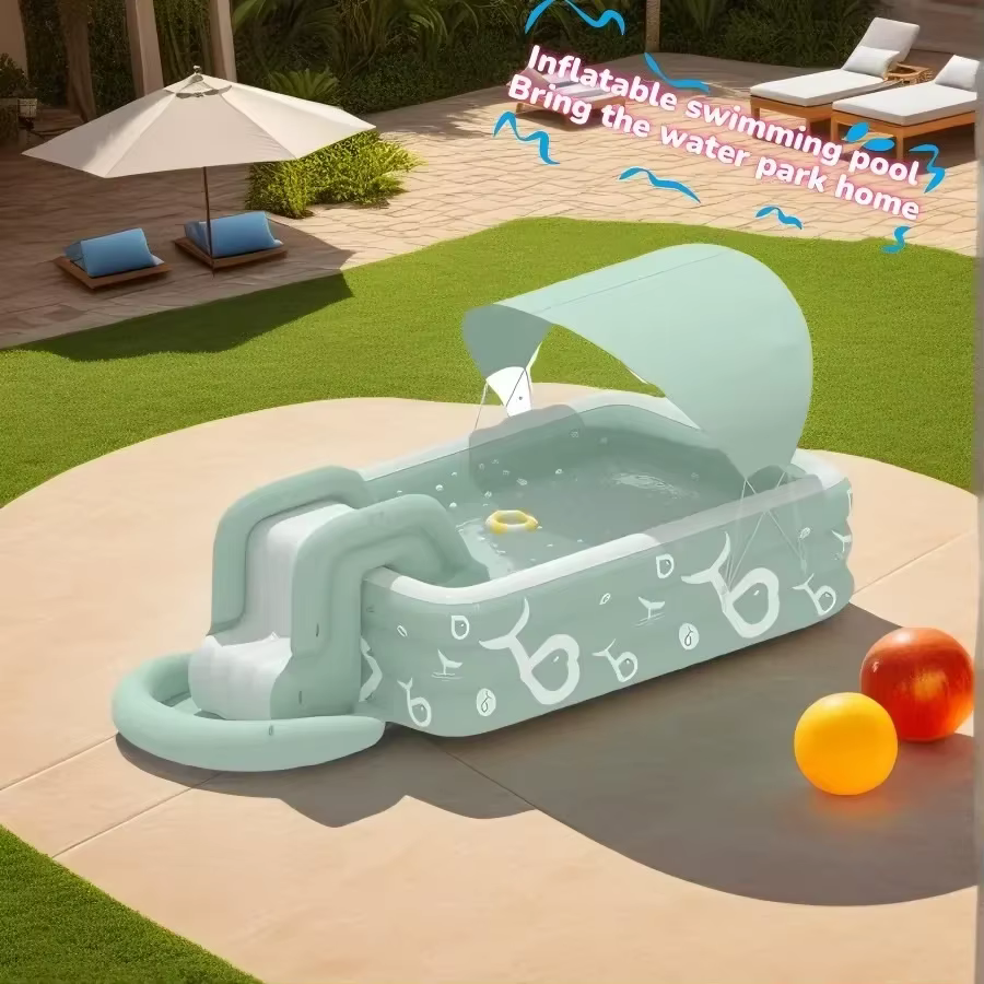 Grande piscine gonflable avec toboggan et abri